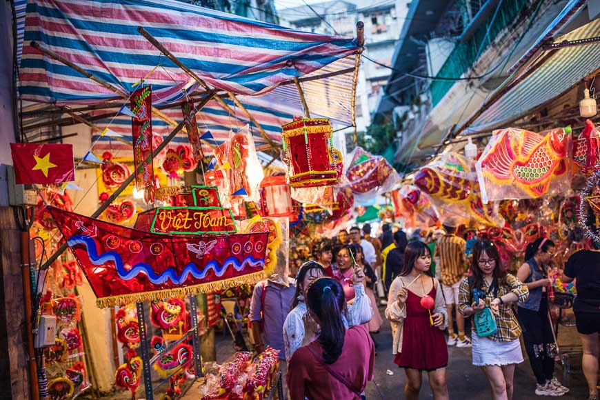 Families pick up lanterns, toys and treats in the alleyways of Ho Chi Minh City's Cholon District.